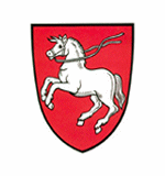 Wappen des Marktes Haag i.OB; In Rot ein springendes silbernes Ross mit Zaum.